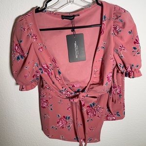 Pretty Little Thing brand new 2 piece skirt set. Size 6 Color Pink floral